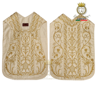 Emblematik by Pasamanerias y Bordados white silk Roman chasuble with intricate gold floral embroidery