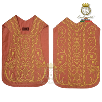 Emblematik by Pasamanerias y Bordados rose silk Roman chasuble with intricate gold floral embroidery for clergy