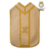 Emblematik by Pasamanerias y Bordados cream liturgical chasuble with gold lace trim and Marian monogram embroidery.