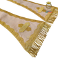 Emblematik by Pasamanerias y Bordados cream liturgical stole with intricate gold embroidery, lace trim, and fringe.