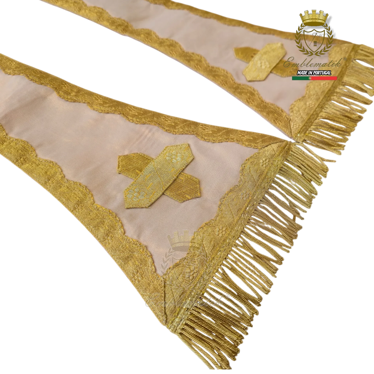 Emblematik by Pasamanerias y Bordados cream liturgical stole with intricate gold embroidery, lace trim, and fringe.
