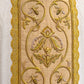 Close-up of handmade gold bullion embroidery and bee motifs